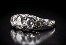 Vintage three-stone engagement ring on a woman's hand