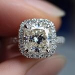 How do cushion cut diamonds perform in different lighting conditions