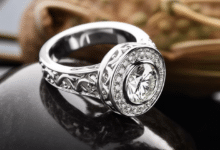 Person cleaning a silver ring with a soft cloth