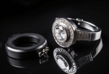 Photo of an engagement ring with a home safe in the background