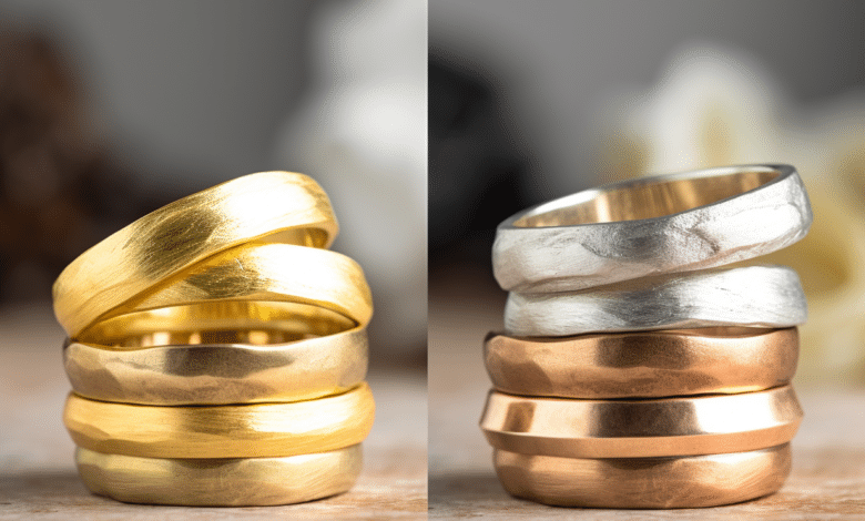 Couple wearing mixed gold wedding rings