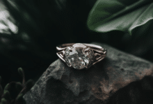 Asymmetrical engagement ring with unique gemstone setting