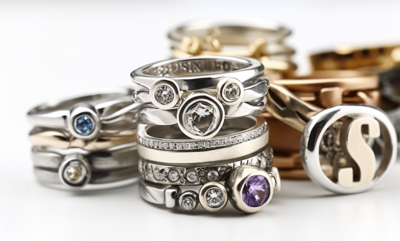 Stylish woman wearing stacked initial rings