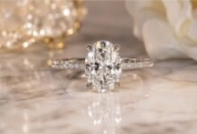 Realistic oval diamond engagement ring with sparkling pavé band