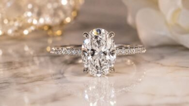 Realistic oval diamond engagement ring with sparkling pavé band