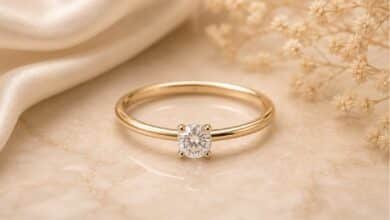 Thin band engagement ring with delicate gold band, secure diamond setting, and elegant daily wear style