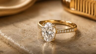 Yellow Gold Engagement Rings Are Back 3 Oval yellow gold diamond engagement ring on warm marble